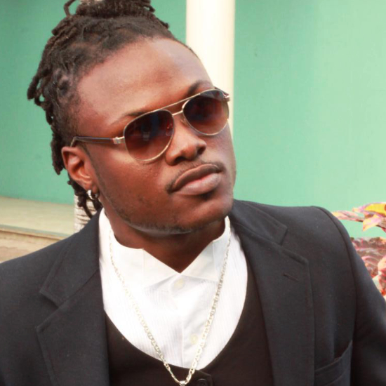 Portrait of Fucha Kid (Feds Boss), winner of InterContinental Music Awards 2022, posing for their award