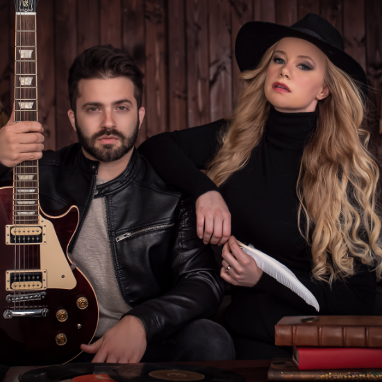 Portrait of Meg Pfeiffer & Luca Stricagnoli, winner of InterContinental Music Awards 2022, posing for their award