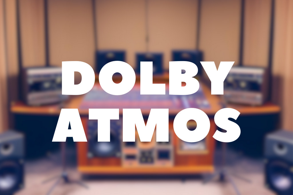 Image of an audio studio featuring multiple speakers used for Dolby Atmos mixing. The written text 'Dolby Atmos' is visible in the image. This technology allows for immersive, three-dimensional sound that enhances the audio experience for viewers.