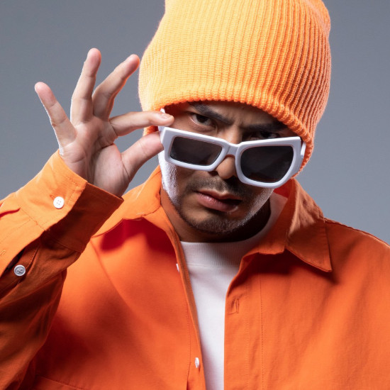 Portrait of Namewee, winner of InterContinental Music Awards 2023, posing for their award