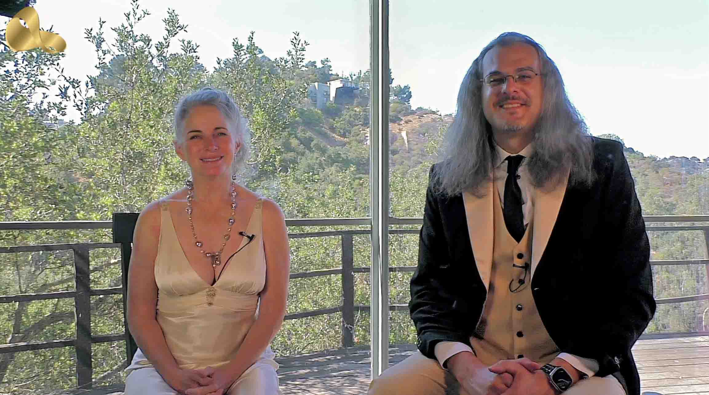 Screenshot of Shahed Mohseni Zonoozi and Karen Lorre hosting the 2025 InterContinental Music Awards online ceremony.